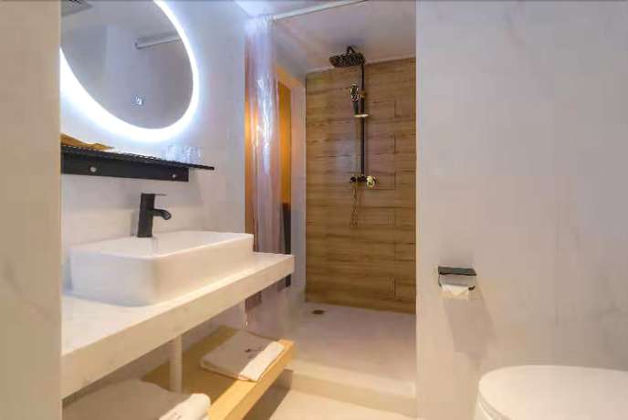 Imagen de la habitación del Hotel De La Reine Bar and Spa Guangzhou. Foto 14