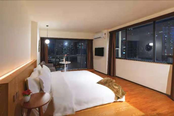 Imagen de la habitación del Hotel De La Reine Bar and Spa Guangzhou. Foto 17