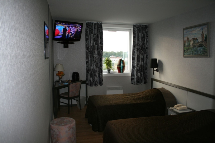 Imagen de la habitación del Hotel De La Tour, Dampierre-sur-Salon. Foto 10