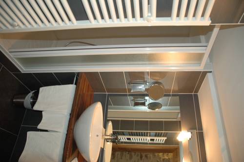 Imagen de la habitación del Hotel De La Tour, SAINT ETIENNE. Foto 12