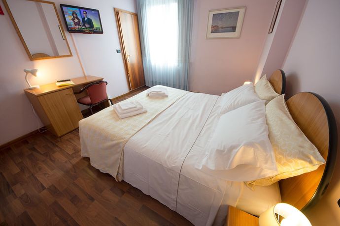 Imagen de la habitación del Hotel De La Ville, Fano. Foto 14