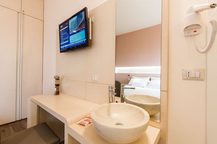 Imagen de la habitación del Hotel De La Ville, Fano. Foto 17