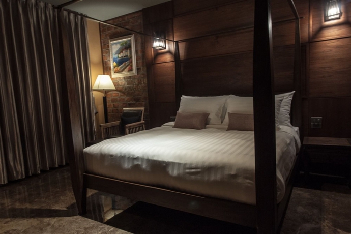Imagen de la habitación del Hotel De L'amour. Foto 2