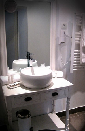 Imagen de la habitación del Hotel De L'amphithéâtre. Foto 9