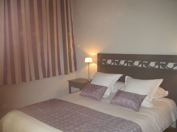 Imagen de la habitación del Hotel De L'amphithéâtre. Foto 10