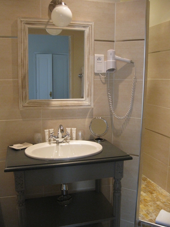 Imagen de la habitación del Hotel De L'amphithéâtre. Foto 14