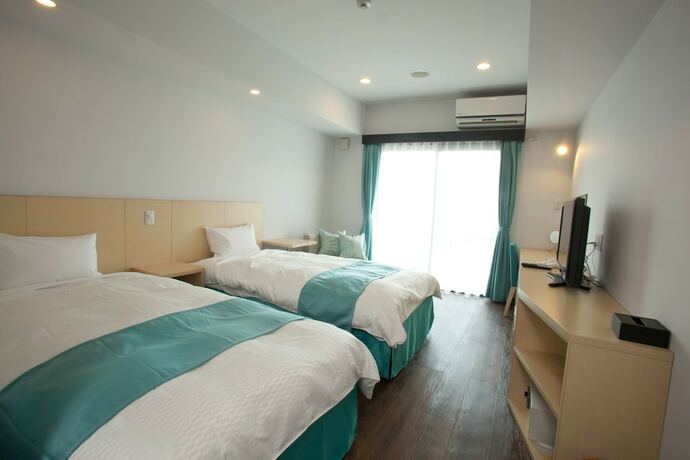 Imagen de la habitación del Hotel De L'aqua Miyakojima. Foto 21