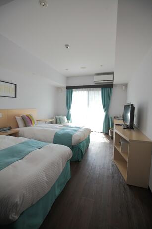 Imagen de la habitación del Hotel De L'aqua Miyakojima. Foto 25