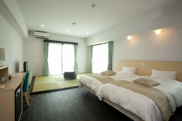 Imagen de la habitación del Hotel De L'aqua Miyakojima. Foto 29