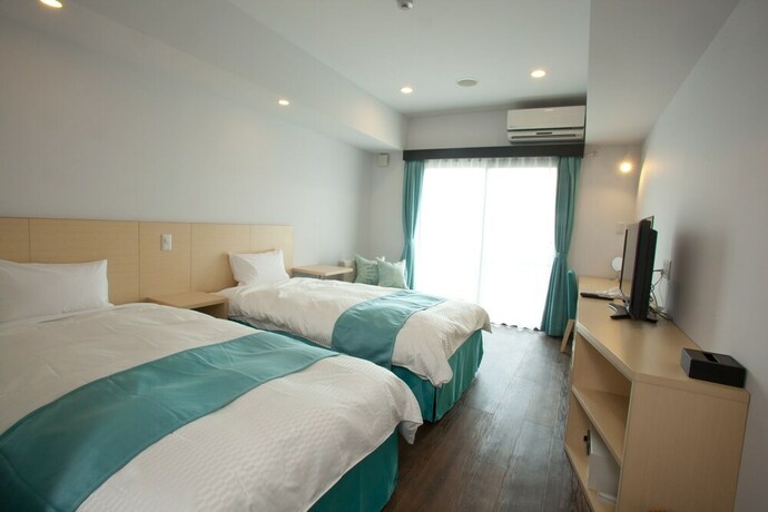 Imagen de la habitación del Hotel De L'aqua Miyakojima. Foto 31