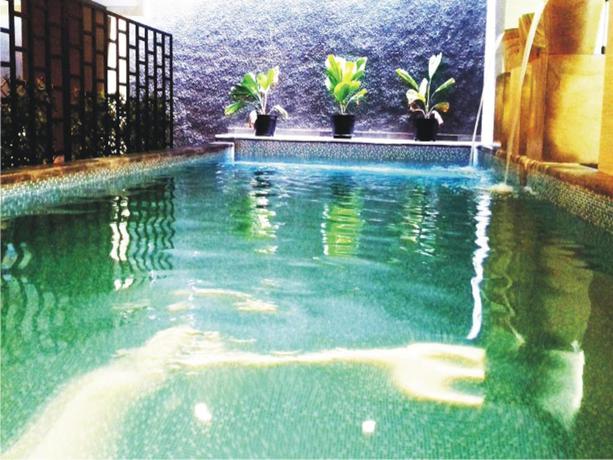 Imagen de la piscina del Hotel De Laxston by Azana. Foto 8