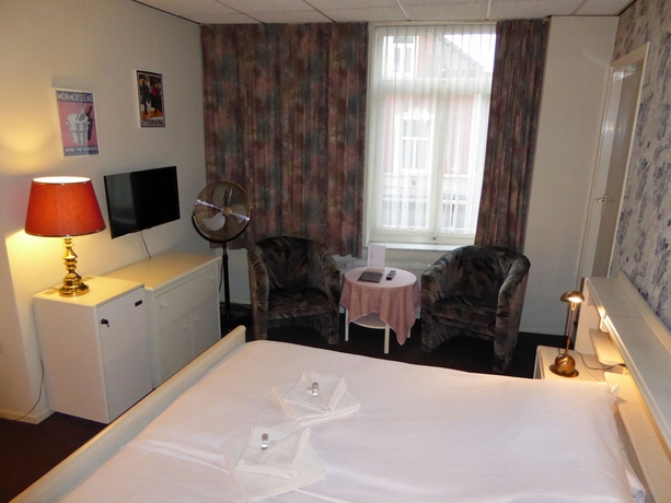 Imagen de la habitación del Hotel De L'empereur Valkenburg. Foto 7