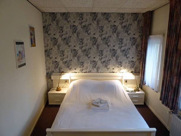 Imagen de la habitación del Hotel De L'empereur Valkenburg. Foto 10