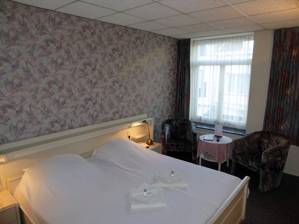 Imagen de la habitación del Hotel De L'empereur Valkenburg. Foto 18