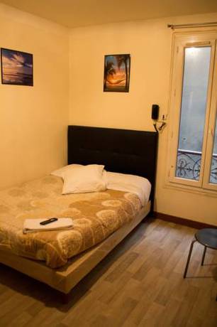 Imagen de la habitación del Hotel De L'europe Belleville. Foto 9