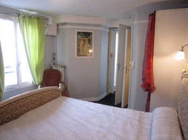 Imagen de la habitación del Hotel De Lille - Louvre. Foto 6