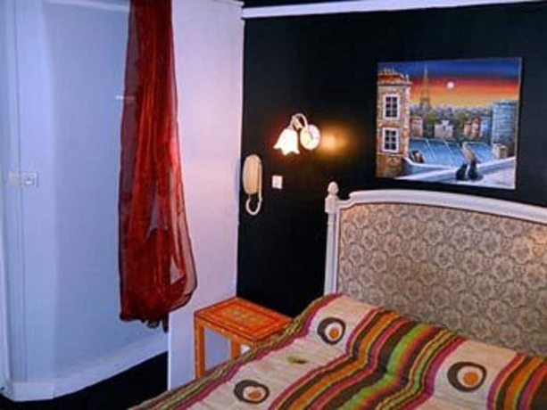 Imagen de la habitación del Hotel De Lille - Louvre. Foto 13