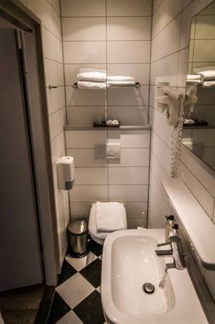 Imagen de la habitación del Hotel De Limbourg. Foto 4