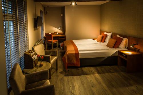 Imagen de la habitación del Hotel De Limbourg. Foto 5