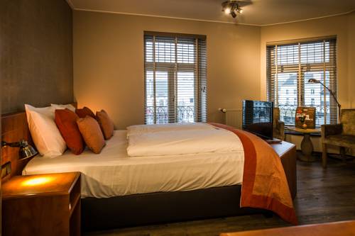 Imagen de la habitación del Hotel De Limbourg. Foto 10