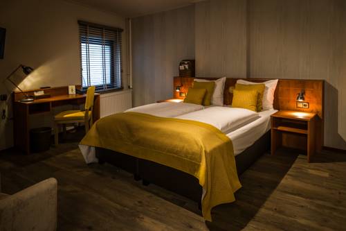 Imagen de la habitación del Hotel De Limbourg. Foto 11
