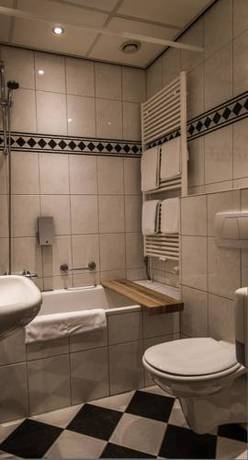 Imagen de la habitación del Hotel De Limbourg. Foto 12