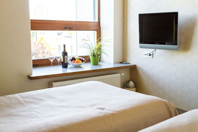 Imagen de la habitación del Hotel De Lita. Foto 19
