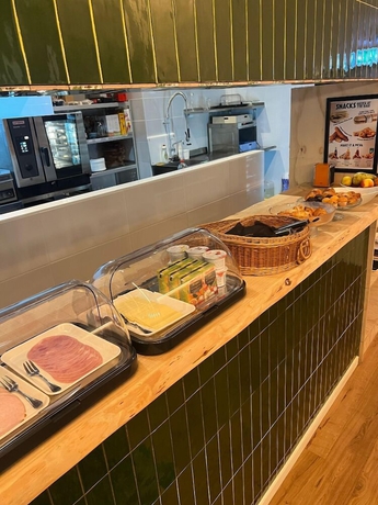 Imagen del bar/restaurante del Hotel De Lola Podshotel. Foto 5