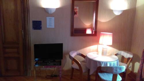 Imagen de la habitación del Hotel De L'orangerie. Foto 6