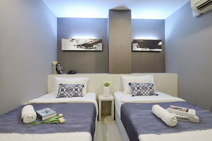 Imagen de la habitación del Hotel De Lux Bangkok. Foto 12