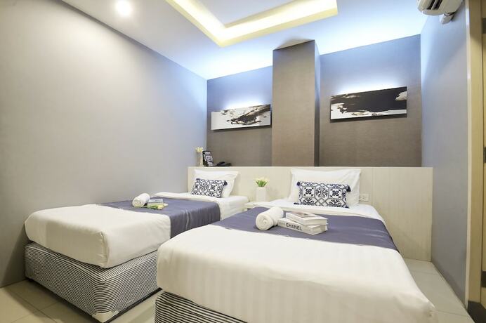Imagen de la habitación del Hotel De Lux Bangkok. Foto 14