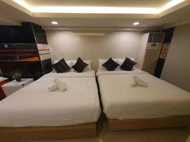 Imagen de la habitación del Hotel De Lux Bangkok. Foto 15