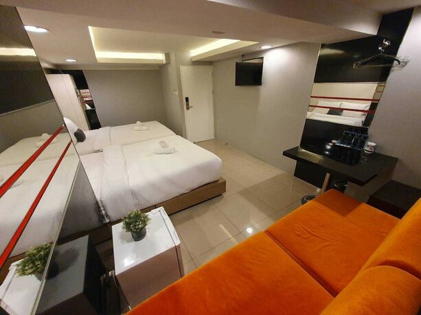Imagen de la habitación del Hotel De Lux Bangkok. Foto 16