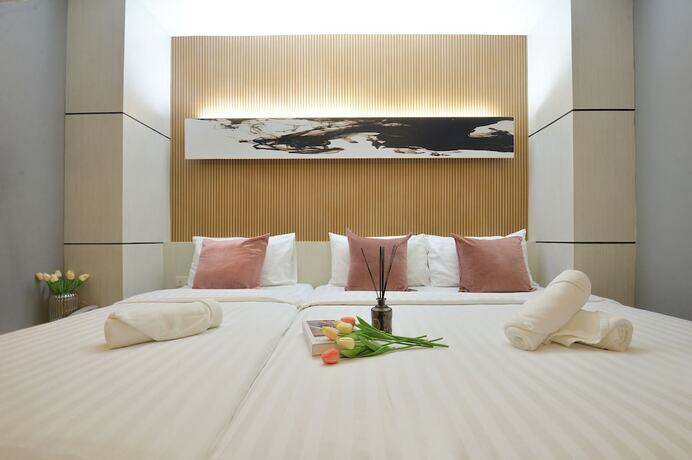Imagen de la habitación del Hotel De Lux Bangkok. Foto 17