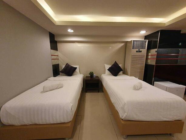 Imagen de la habitación del Hotel De Lux Bangkok. Foto 20