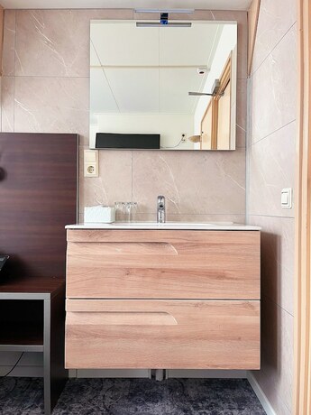 Imagen de la habitación del Hotel De Magneet. Foto 14