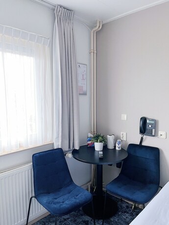 Imagen de la habitación del Hotel De Magneet. Foto 16
