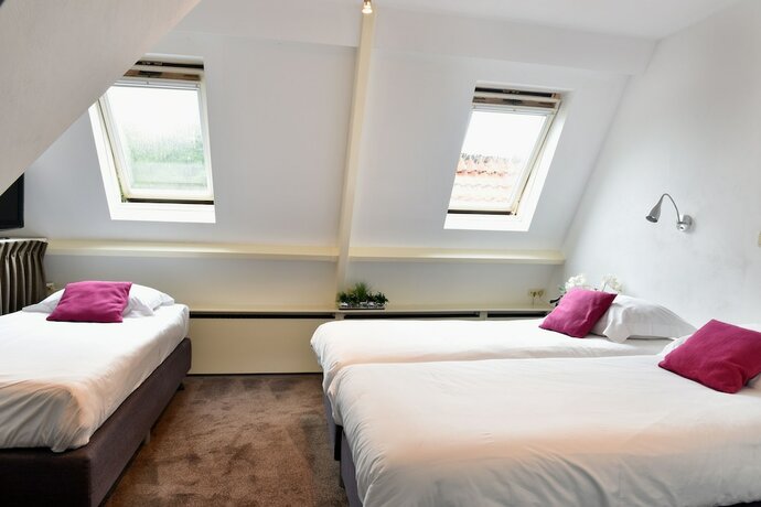 Imagen de la habitación del Hotel De Magneet. Foto 17