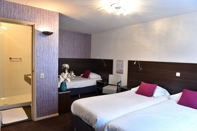 Imagen de la habitación del Hotel De Magneet. Foto 19