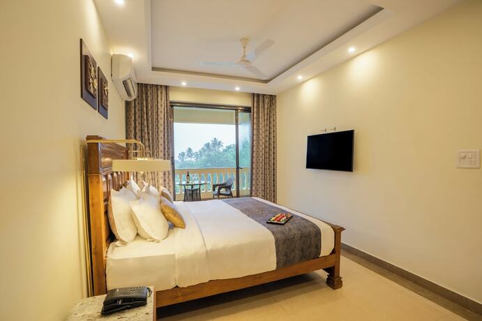 Imagen de la habitación del Hotel De Mandarin Beach Resort Suites and Villas. Foto 13