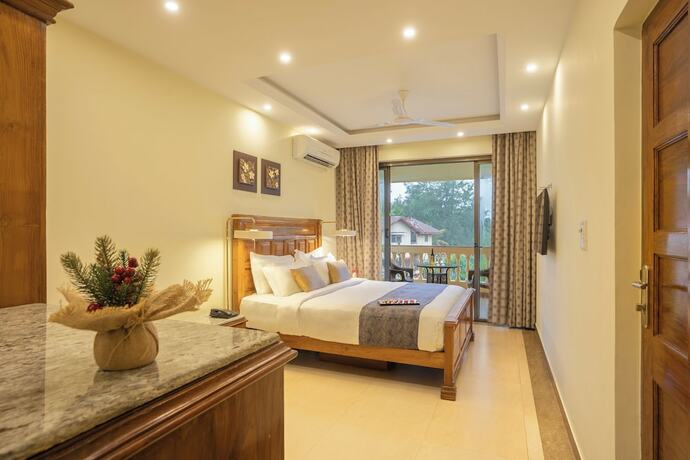 Imagen de la habitación del Hotel De Mandarin Beach Resort Suites and Villas. Foto 14