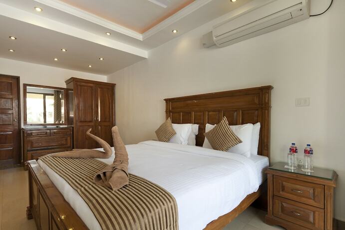 Imagen de la habitación del Hotel De Mandarin Beach Resort Suites and Villas. Foto 17