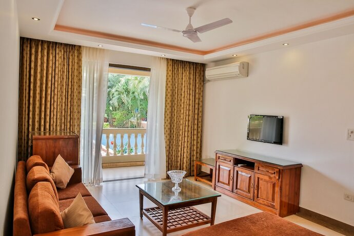 Imagen de la habitación del Hotel De Mandarin Beach Resort Suites and Villas. Foto 18