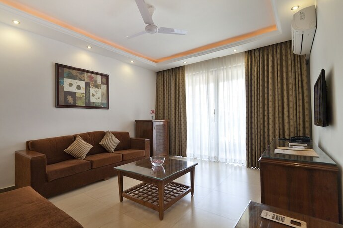 Imagen de la habitación del Hotel De Mandarin Beach Resort Suites and Villas. Foto 20