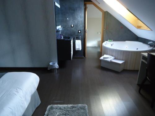 Imagen de la habitación del Hotel De Martin. Foto 8