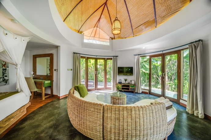 Imagen de la habitación del Hotel De Moksha Eco Friendly Boutique Resort. Foto 4