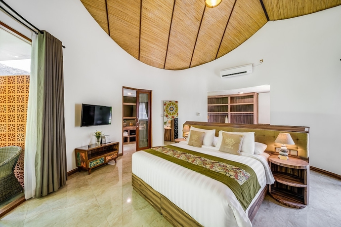 Imagen de la habitación del Hotel De Moksha Eco Friendly Boutique Resort. Foto 7