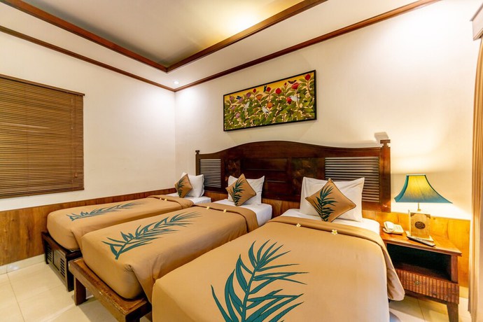 Imagen de la habitación del Hotel De Munut Balinese Resort and Spa. Foto 5