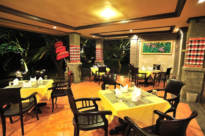 Imagen del bar/restaurante del Hotel De Munut Balinese Resort and Spa. Foto 2