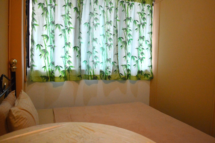 Imagen de la habitación del Hotel De Nai Backpacker's Residence. Foto 8